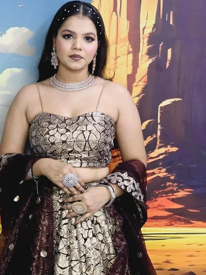 A modern lehenga paired with a layered American Diamond necklace and oversized statement rings. This shows how to accessorize a contemporary ethnic outfit.