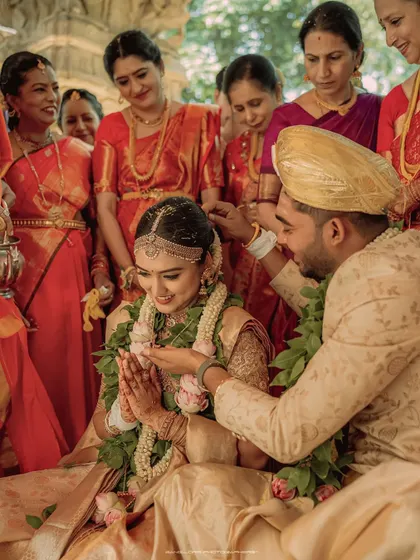 Surrounded by family and tradition, the couple participates in a sacred wedding ritual. I focus on the reverence and emotion of these key ceremonial moments.