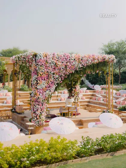 Reality: The final pastel mandap, a perfect mirror of our render. The soft blush and cream florals create a dreamy, romantic atmosphere, showing how we translate digital dreams into tangible beauty.