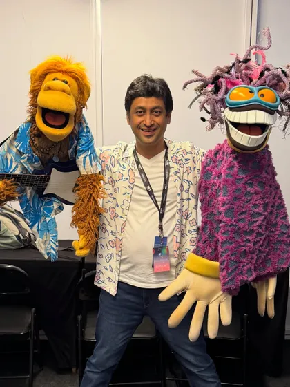 Posing with 'The Weirdos,' the puppet band we created for the Coldplay shows. Each character was designed to have its own unique personality to match the band's vibe.