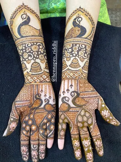 A beautiful design inspired by another artist, showcasing a love for community. This piece is filled with graceful peacock and swan motifs, creating a flowing and artistic look.