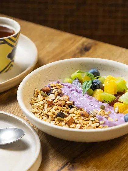 Another beautiful shot of our parfait, featuring creamy hung curd, crunchy granola, and a mix of fresh berries and exotic fruits. It's so tasty, you'll forget it's healthy.