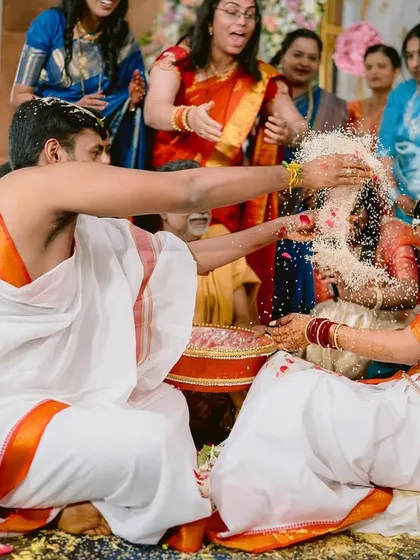 The 'Talambralu' in full swing, a joyous and photogenic ritual from a Telugu wedding.