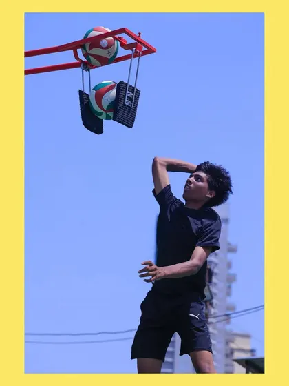 A player practices his spike approach using our stationary ball holder, focusing on timing and arm swing.