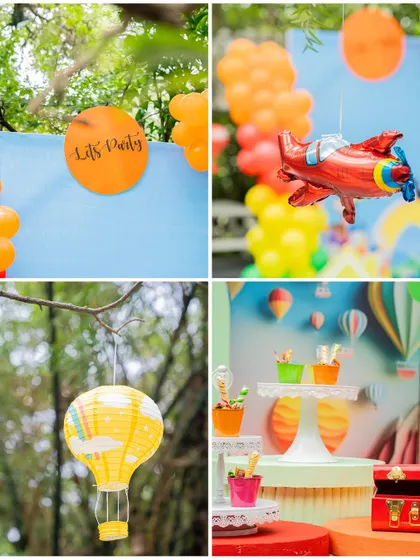 Detail shots from the travel party, including a "Let's Party" sign, an airplane balloon, and a hot air balloon lantern.