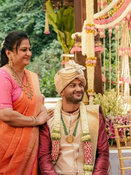 A candid moment of pure bliss during the wedding ceremony. The genuine smiles and loving looks exchanged between the couple are what make a wedding story truly special.