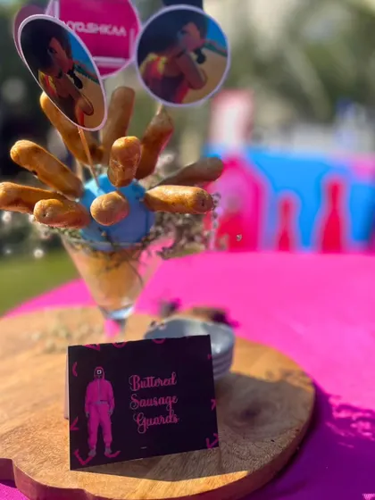 Our "Buttered Sausage Guards" were a fun and savory addition to the Squid Game themed menu, creatively presented to match the electrifying vibe of the party.