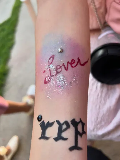 A "Lover" era inspired arm painting, complete with a colourful aura and lots of sparkle. I love creating custom designs for any theme.
