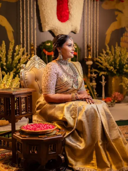 Grace and elegance personified. This is a full look I created for a housewarming ceremony, featuring a beautiful golden saree and regal makeup that made my client feel like royalty in her new home.