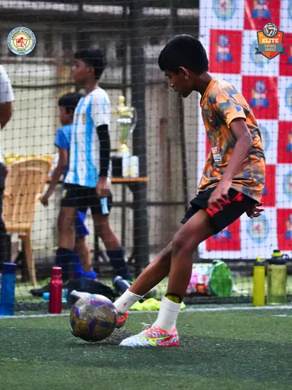 A player prepares to make a pass, demonstrating good technique and awareness during a Friends' Cup fixture.