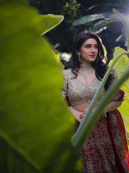 A beautifully framed shot of Mahima. The makeup is soft and elegant, with a focus on enhancing her natural beauty in a subtle and sophisticated way.