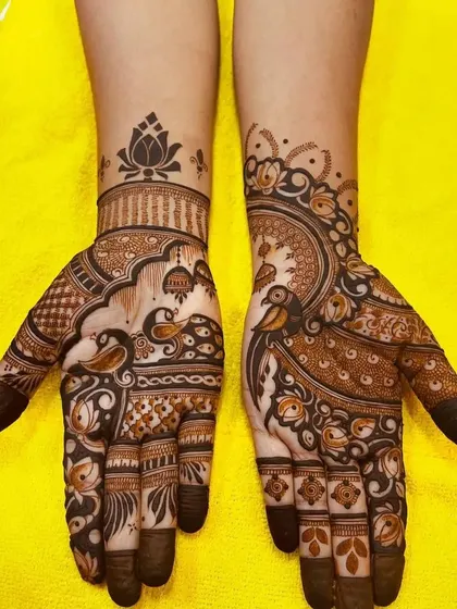 A more intricate design for Raksha Bandhan, with peacocks and lotus flowers. This is perfect for someone who wants a fuller look for the festival.
