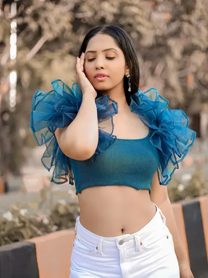A gentle, expressive pose that adds a soft touch to the set.
