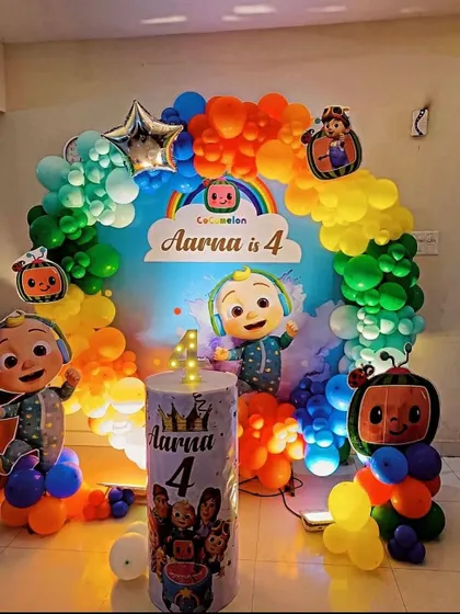 Look how bright and colorful this Cocomelon theme decoration is. I use a rainbow balloon arch and life-size cutouts of JJ and his friends to make the party feel just like the show.
