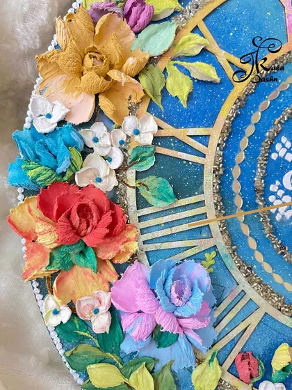 Another detail from the galaxy clock, showing the variety of flowers and the glitter accents that mimic a starry night sky.