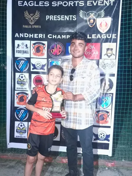 A player from our U11 team receiving an award at the Andheri Champions League.