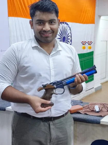 Our champion Kanhaiya Bajaj holding his pistol after winning the Gold medal at the MAGC State Shooting Championship in Nasik. A fantastic achievement.