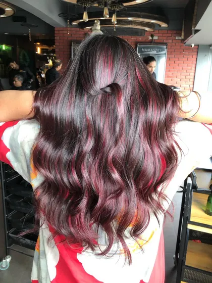 A stunning Red Wine Balayage. Red is a great choice as it fades to a beautiful brown, giving you two looks in one.