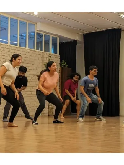 Students learning a classic Bollywood move during our high-energy SRK workshop.