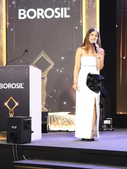 Commanding the stage at the Borosil Annual Awards in Dubai. From this position, I guide the flow of the evening, from formal announcements to celebratory moments.
