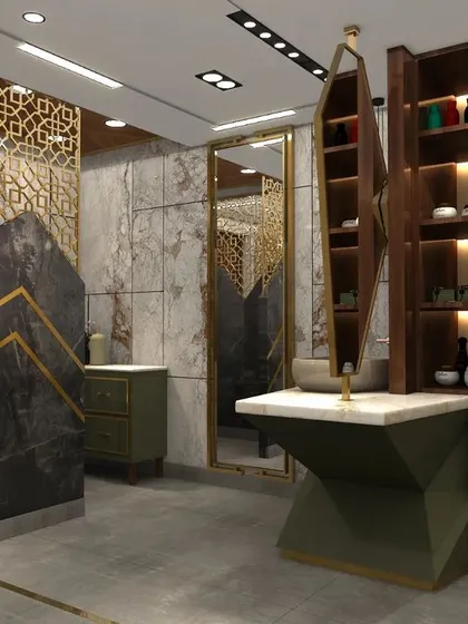 This angle highlights the stunning pillar detail, which combines dark marble with gold geometric inlays and a CNC-cut metal screen.