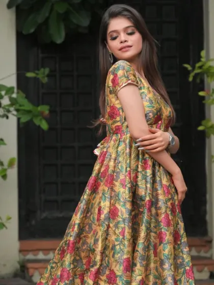 This floral Kalamkari print Anarkali dress has a wonderful flow and rich color palette. The V-neck and empire waist are classic details that I can incorporate into custom plus-size garments.