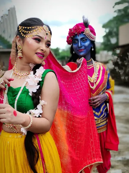 Another shot of Radha and Krishna, capturing a moment of interaction that brings the characters to life.