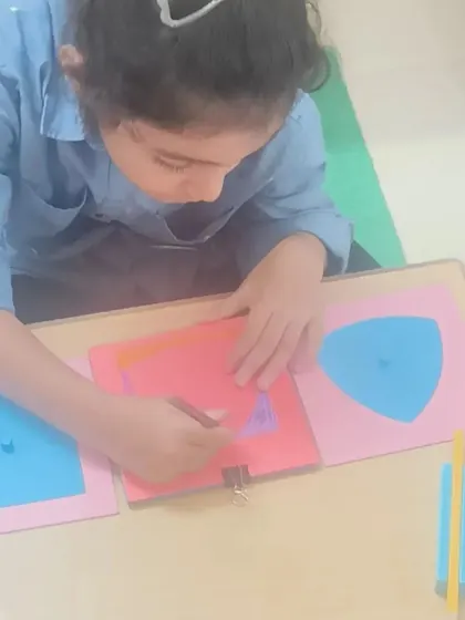 We are so happy to be back in our Happy Space after the break. Here, a child is using the metal insets, a classic material that develops the fine motor skills needed for beautiful handwriting.