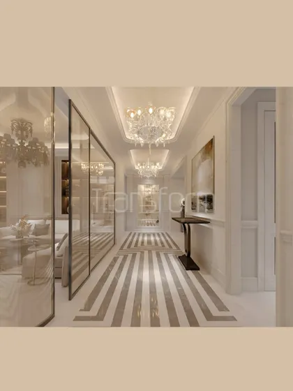 This foyer is a passage through rhythm and reflection. Bold marble lines on the floor lead the eye, while crystal chandeliers dance with light. The glass partitions create a harmony between transparency and structure.