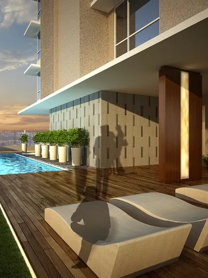 This recreational area is designed with various engaging elements that encourage users to pause and participate. The poolside deck with comfortable loungers and a small waterfall feature creates a resort-like atmosphere for relaxation and socializing.