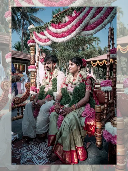 The couple seated on a beautifully decorated traditional swing, or 'oonjal', a significant and picturesque ritual in many South Indian weddings.