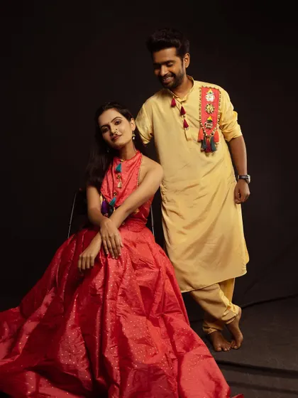 A more playful pose from the same studio session. Having him stand while she is seated adds a nice dynamic to the composition and captures a bit of their personality.