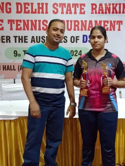 Our coach with Ayushi after her double-medal performance, winning Gold in U-15 and Bronze in U-17 girls at the Delhi State Ranking tournament.