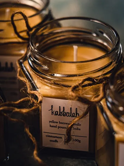 A close-up look at the rich, golden color of the natural beeswax. The rustic twine is a simple, earthy touch that reflects the handmade quality of my products. This moody shot captures the cosy feeling I hope my candles bring you.