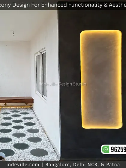 A minimalist balcony design that proves simplicity can be stunning. I used a backlit feature wall for evening ambiance, a floating wooden bench for seating, and a modern pebble pathway to create a clean, serene space.