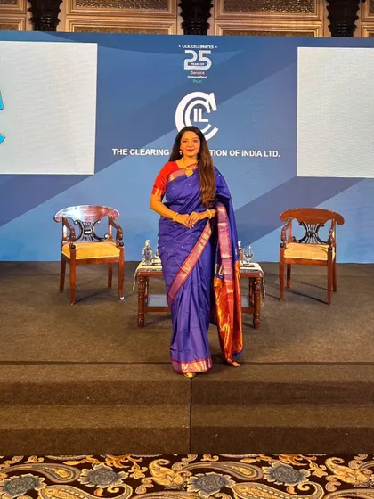 On the stage of the CCIL 25th Commemorative Event at the Taj Mahal Palace, Mumbai. The environment was formal, reflecting the importance of the occasion celebrating two and a half decades of service and innovation in India's financial market.