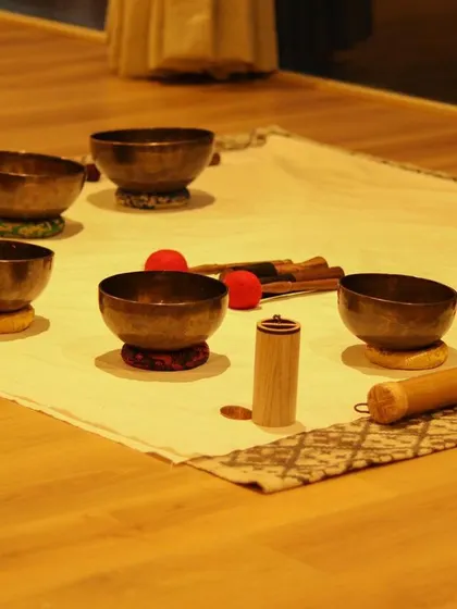 The warm, ambient lighting of the studio enhances the calming effect of the sound healing instruments. This environment is intentionally created to feel safe, peaceful, and conducive to healing.
