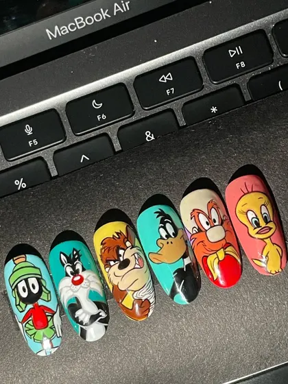 That's all, folks! A full set of Looney Tunes nails, bringing all the chaotic energy of my childhood Saturday mornings. I hand-painted everyone from Marvin the Martian and Sylvester to the Tasmanian Devil and Tweety Bird.