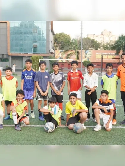 The birthday celebration kicked off with a friendly football match on the field. It's a great way for older kids to burn off energy and enjoy some healthy competition.