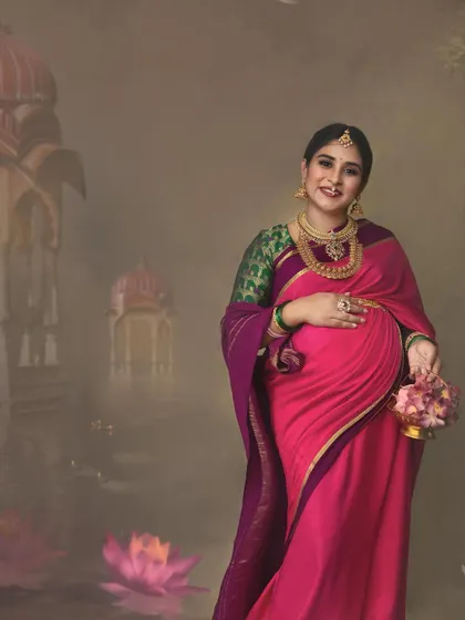 A wider view reveals the custom backdrop, inspired by the architecture of Hyderabad to reflect the client's roots. This is how I weave personal stories into each artistic maternity session.