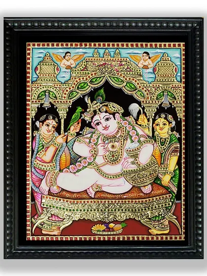 This charming Tanjore painting of Butter Krishna (Makhan Chor) captures his playful and divine nature. The intricate gold work on his jewels and the throne makes this a delightful piece for any devotee.