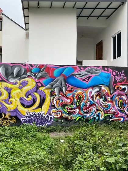 The full wall from our Jakarta jam. A crazy mix of styles, from my curvy letters to my boy's character work.