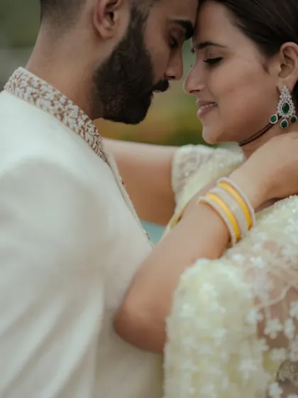 An intimate close-up, focusing on the tender connection between the couple. These shots are all about emotion and subtlety.