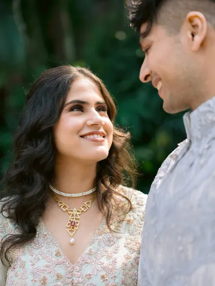 A romantic close-up. This shot highlights her luminous skin and the soft, natural tones of her makeup.