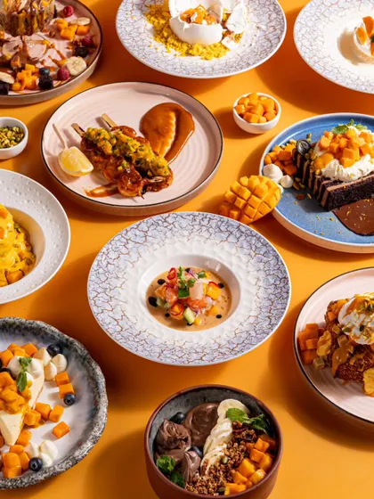 Another angle of the mango festival spread at Bastian, showing both savory and sweet dishes. This highlights the creativity and breadth of the special menu.