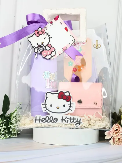 The full Hello Kitty Rakhi hamper, featuring a personalized water bottle, a custom pouch, a cute wallet, and a wooden plaque for the "Little Sister."