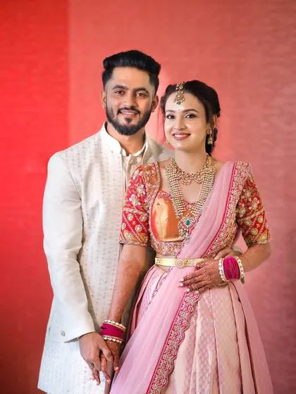 My sweetheart bride-to-be with her partner. Her engagement look is a beautiful pink langa davani, and the makeup is soft and romantic.