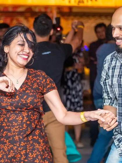 A happy and relaxed couple enjoying the music.