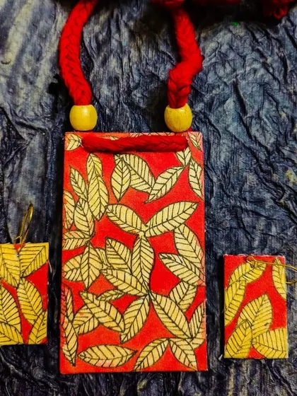 These images showcase the wide variety of my fabric jewelry collection, including different prints, paintings, and color combinations, all available for wholesale.