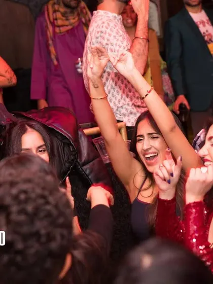 The dance floor at Bollywood Disco is a place of celebration. Look at the smiles and energy from this group of friends enjoying the night.
